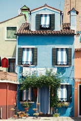 Murano island. Colorful facade of the building