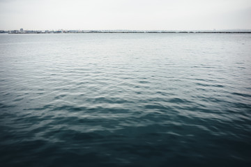 Landscape calm sea in gray winter day