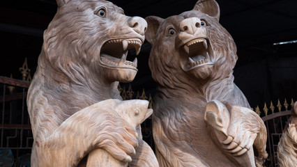 Hindu and Buddhist wooden carving. souvenir shop selling souvenirs and handicrafts of Bali at famous Ubud Market, Indonesia