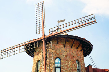 Traditional dutch windmill near the canal. Netherlands