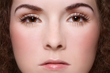 Fototapeta premium Close-up portrait of young beautiful girl with clear makeup