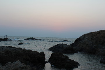 Fototapeta na wymiar sunset on coast of sea