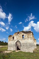 Fototapeta premium Abandoned Medieval Eastern Orthodox church of Saint John of Rila at the bottom of Zhrebchevo Reservoir, Sliven Region, Bulgaria