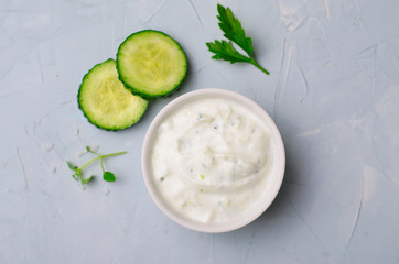 Tzatziki, Yoghurt Sauce with Cucumber on Bright Background