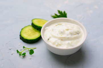 Tzatziki, Yoghurt Sauce with Cucumber on Bright Background