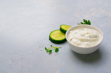 Tzatziki, Yoghurt Sauce with Cucumber on Bright Background