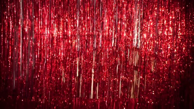 Background - shiny red festive tinsel