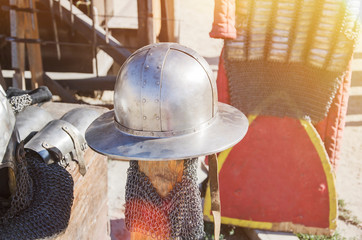 helmet of an old knight in the sunlight outdoors