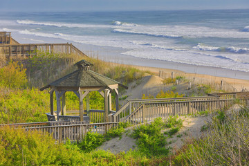 The Outer Banks in North Carolina is a popular vacation destination on the beach.  The homes along...
