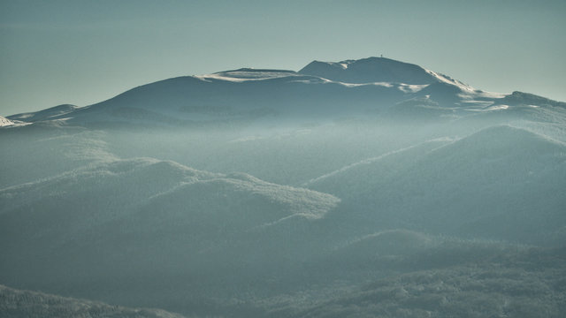 Tarnica peak in winter scenery. Snow winter in the mountains. Bieszczady. Poand