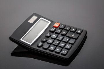 Obraz premium Old black old-style calculator