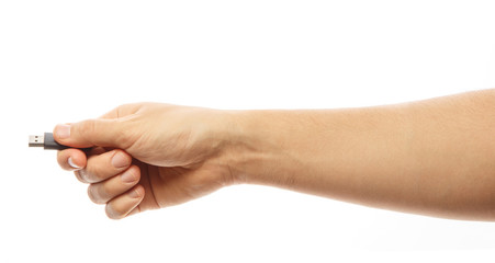 Flash drive in hand isolated on white background. Hand with an USB flash. Alpha.