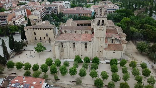 View from drone of ancient Benedictine abbey in Sant Cugat del Valles, Catalonia, Spain