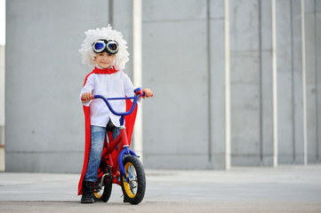 A funny, little superhero. Concept boy imagination. Happy childhood.