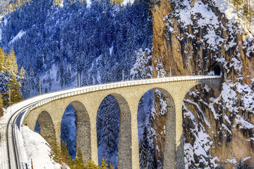 Landwasser Viaduct, which ia a wonder of Swiss mountain railway engineering in 1901 and a unesco...