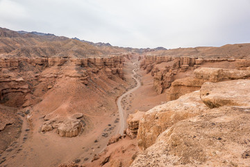 Fototapeta na wymiar beautiful road winds in Charyn canyon in Kazakhstan 