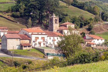 Rural village in the mountains of Asturias in the north of Spain on a sunny day.