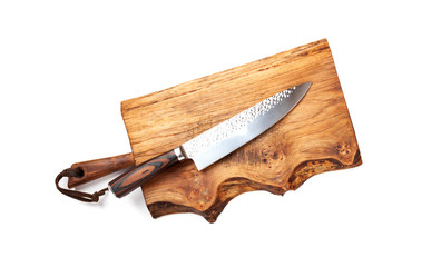 Knife for kitchen on old wooden cutting Board
