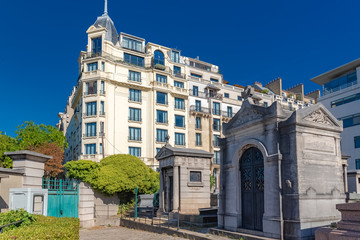 Paris, Montmartre cemetery, graves, with beautiful building in background
