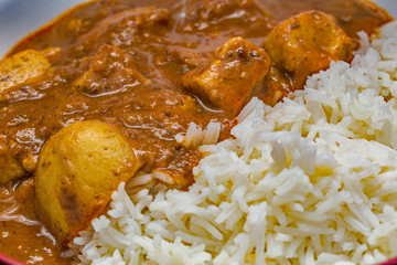 Pork vindaloo curry and rice