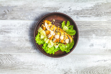 Chicken with pineapple, lettuce, cream sauce and walnut