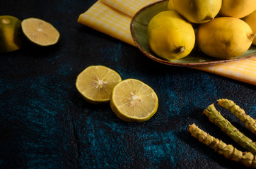 Fresh ripe lemons on wooden table