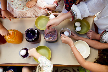 Group of Kids Dyeing Easter Eggs from Above