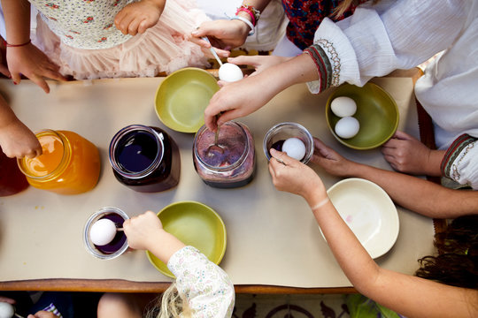 Group of Kids Dyeing Easter Eggs from Above