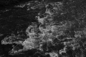 Wild white water river flowing rapids