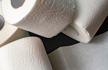 close up toilet paper rolls stack isolated