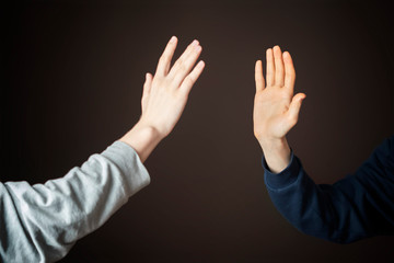 portrait of two men give high five and celebrate victory d