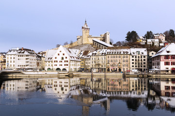 Fototapeta na wymiar The old Swiss town with its medieval fort Munot in winter atmosphere.