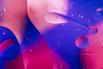Abstract macro background of oil drops on water