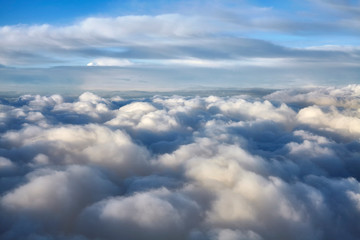 Cloudscape seen through an airplane window