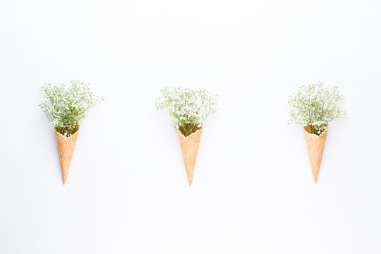Fototapeta Flowers composition. Gypsophila flowers on pastel pink background. Flat lay, top view, copy space