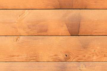 wooden wall in the sunlight