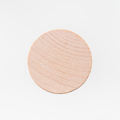 Abstract floating wooden cylinder on white background