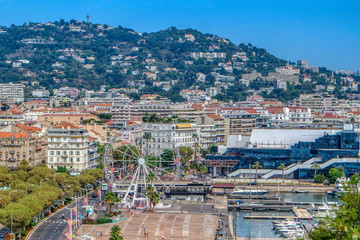 Fototapeta premium Ferris wheel on Promenade De la Pantiero in Cannes, Cote dAzur, French, Riviera, South of France, Europe