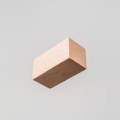 Abstract floating wooden rectangle on white background