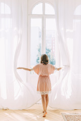  Fees and photo shoot in the interior Studio. Morning of the bride dress in the boudoir, in bed.