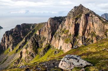 Mountains by the sea in Lofoten, Norway on a cloudy day