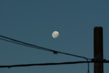 The moon in a blue sky