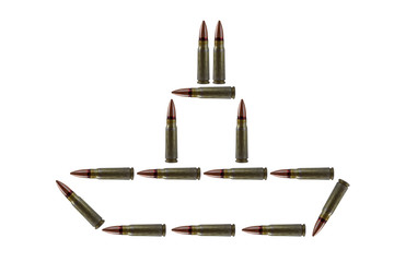 Abstract creative image of a ship, made of bullets on a white background isolated