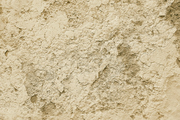 Old beige stone concrete wall background texture