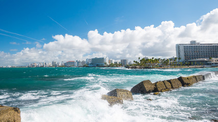 The Atlantic Ocean and waves on a beautiful hot, sunny and windy day. San Juan, Puerto Rico