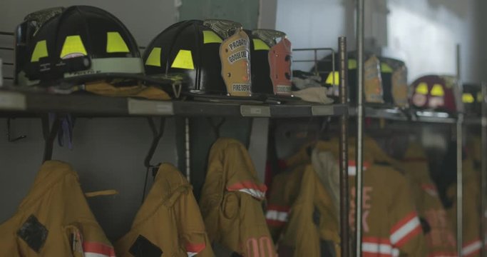 Firefighter helmets and coats hanging
