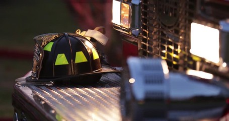 Fire helmet on front bumper of a firetruck
