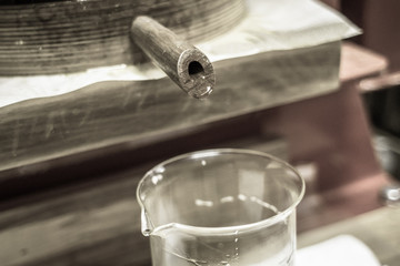 Manual production of vegetable oil. Press for pressing oil from seeds and nuts. Production of...