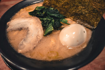 Fresh warm ramen soup with beef seaweed and boiled egg