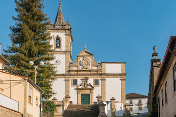 The facade of the parish church of Sao Joao Baptista combines the Mannerist and Baroque styles and...